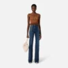 Pantalón denim palazzo con botones
