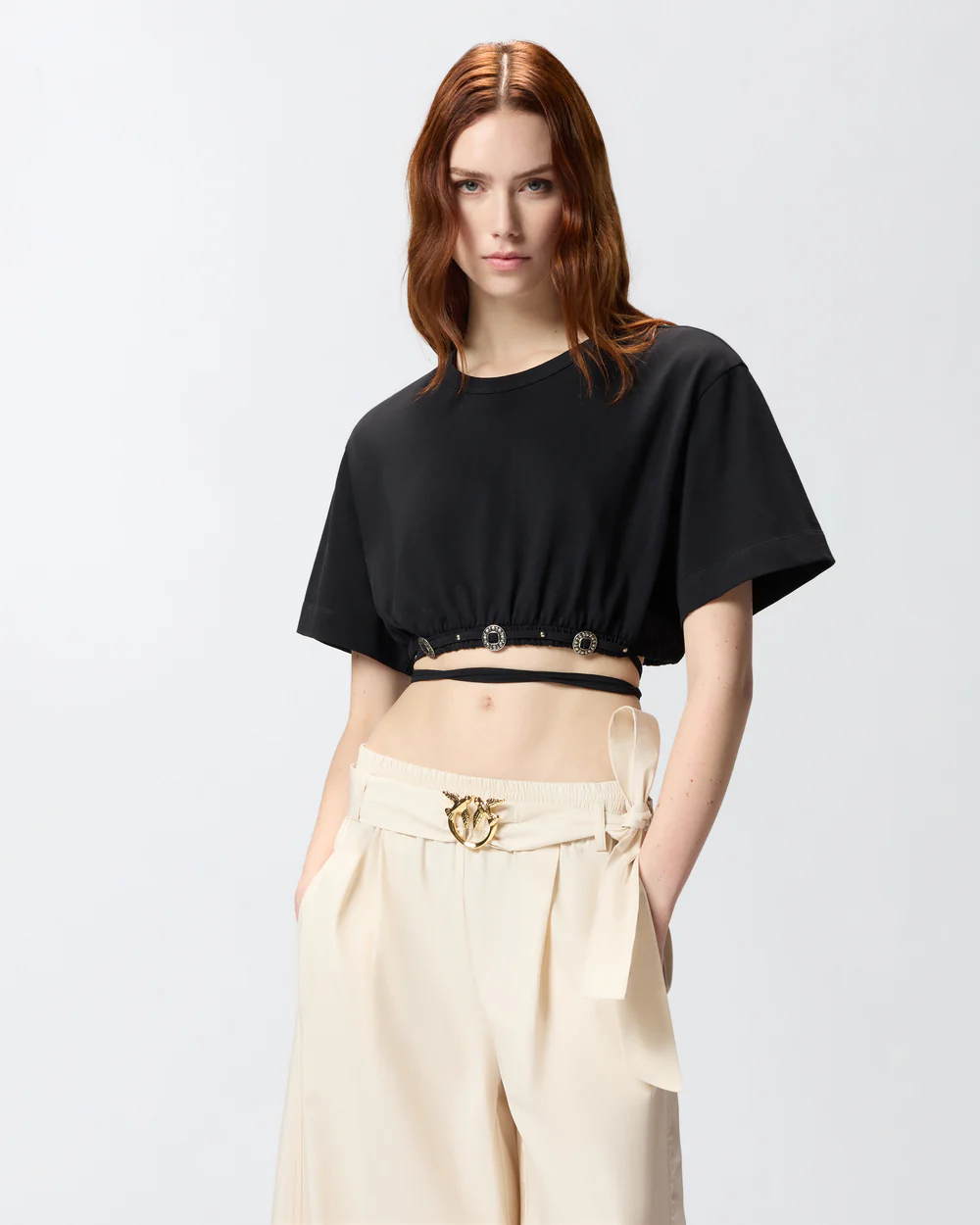 Camiseta corta con cordón y detalles texanos