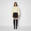 Cardigan de punto con botones dorados