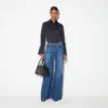 Pantalón denim de pata ancha con bolsillos